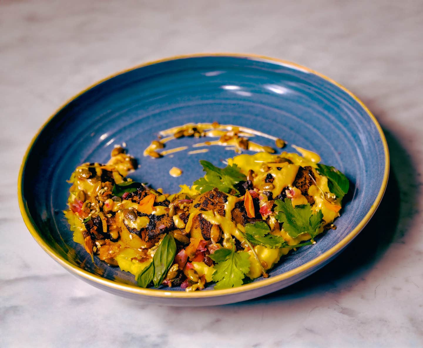 Hokkaido Scallops with Yucca, Sweet Platano, Plantain Pepita Dukkah, and Berbere Sofrito Cream Sauch